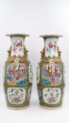 A lot of two Chinese Famille Rose decorated porcelain vases - with decor of palace scene and flora