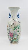 A Chinese Qianjiang and Famille Rose decorated porcelain vase - decorated with peonies and branches
