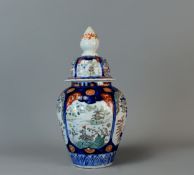 A Japanese Imari baluster vase and cover. Late Meiji / Taisho period. Hand painted. Height - 30cm 