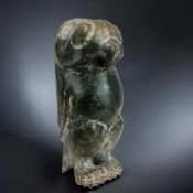 A Chinese hardstone bird of prey carving. In the Hongshan style. Height - 18cm 
