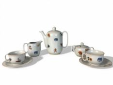 A vintage continental ceramic Childs teaset. Includes teapot, milk, sugar & two cups & saucers.