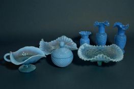 A collection of vintage blue Vaseline glass. 