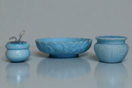 A Fenton satin glass 'Water Lily' ashtray, together with two lidded boxes.