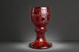 A 19th century Masonic ruby glass Goblet. Bohemia, C1890. Engraved with Masonic imagery.  Facetted s