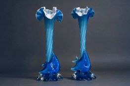 A pair of Murano style 'Fish' stem vases. 