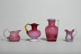 A Victorian Stevens & Williams pink cased jug, with Amber 'thorn' handle. together with a Cranberry 