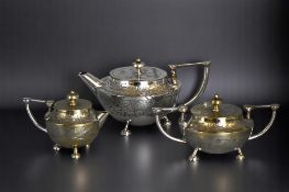 An early 20th century silver plate miniature teaset. J Boseck & co. With Shell & seaweed pattern. Te
