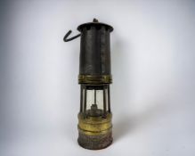 Antique brass miners lamp. Maker unknown. 