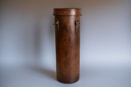A vintage leather travel bottle holder. With stitched initials and glass bottom. 