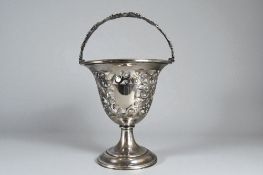 Elkington & Co silver plate sweetmeat dish. Basket shape, with Grape vine handle.Â  Height - 23cm