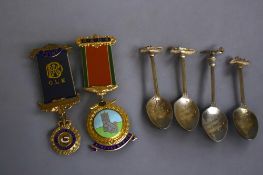 Two silver gilt medals. Together with four silver plate Falklands victory memorial spoons. 