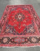 Large 313cm x 202cm Vintage Middle Eastern Red Ground Rug With Central Lozenge and Stylized Floral B