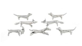 Suite de 7 porte-couteaux animaux en étain fin, Suisse, XXe s., long. de 8,5 à 11 cm