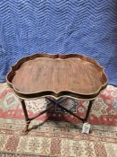 A Vintage-Style Tray-Top Coffee Table, Likely Manufactured By Maitland-Smith The Table Features A,
