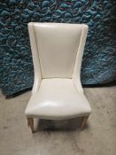 Wingback Accent Chair Cream Or Off-White Leather Accent Chair With A High, Slightly Curved Back