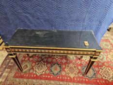A Louis XVI Style Ebonised And Gilt Console Table The Canted Top Raised Over A Decorative Frieze