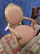 A Pair Of Louis XVI-Style Medallion Fauteuils Gilt Moulded Wood And Carved With A Carved Medallion
