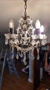 A antique brass and crystal 4 arm crysta chandelier 400 x 600mm