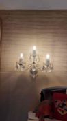 Artglass Czech neoclassical style Crystal three arm wall sconce central base mounted to a wall from