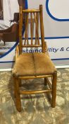Hand-Carved Wooden Accent Chair: Arts and Crafts with Natural Hide This exquisite hand-carved wooden