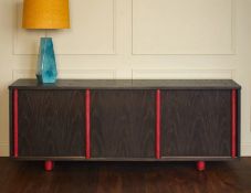 Julian Chichester Nico Cabinet, influenced by Jacques Adnet, is a stylish and functional addition to