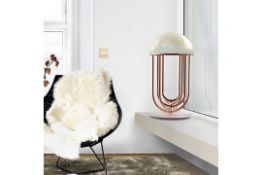 Inspired by the iconic energy of Tina Turner, the Ascot table lamp captures her electrifying stage