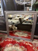A large, rectangular mirror with a wide, ornate silver-coloured frame, bevelled mirror plate 118 x