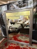 A large, rectangular mirror with a wide, ornate silver-coloured frame, bevelled mirror plate 127 x