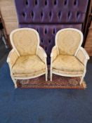A pair of Louis XVI style bergères perfectly captures the refined elegance of its era. Each chair'