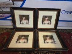 This set of four framed and glazed prints features reproductions of 