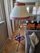 Inspired by the iconic designs of Gio Ponti, this modern Italian tripod floor lamp from 1952