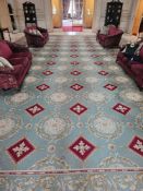 Abusson style palace carpet This large wool carpet, displays a classical revival style with a