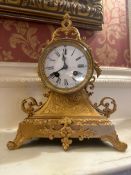 French Napoleon III Style Ormolu Mantel Clock with Scrolled Base and Acanthus Motifs An ornate