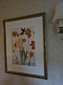 A pair of contemporary botanical prints, each presented under glass with a white mat within a gold-