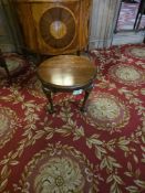 A Queen Anne style occasional table, mahogany, presenting in an 18th-century style. The round top