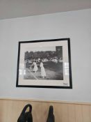 A pair of Wimbledon tennis photographic prints. The first print depicts two female tennis players in