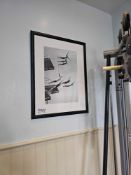 A pair of framed black and white photoprints. The first, titled 'Seven Champion Divers In LA' by