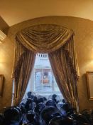 A pair of exceptionally large and opulent window drapes, comprising two full-length curtain panels