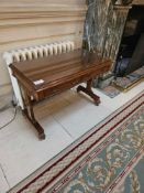 A French Regency style writing table mahogany, it features a rectangular top currently protected