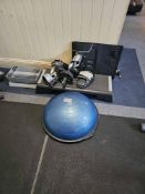BOSU-style balance trainer, 'Dynabalance 500 lbs' and featuring a blue dome with a black base.