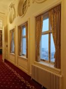 This lot comprises three pairs of traditionally styled drapes, crafted from a heavy, woven textile