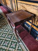 A French Louis XV 18th style Game Table. This occasional table in mahogany has a square top with a