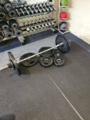A Bodypower Olympic Barbell and Weight Plate Set, comprising a chrome-finished steel Olympic-style