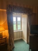 Three Pairs of Window Treatments with Floral Curtains and Tasselled Valances A group of three window