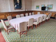 A set of fifteen upholstered chairs, executed in a French-inspired Louis XV style. Each chair