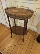 Louis XVI revival style oval, two-tiered occasional table the upper surface features a burr wood