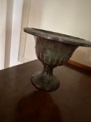 French Neoclassical Style Cast Iron Urn with Verdigris Patina A cast iron urn or planter in the