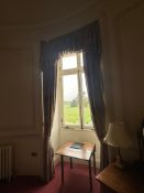 A pair of formal window drapes in traditional revival style. Executed in a traditional or historical