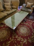 A Regency style rectangular coffee table The tabletop with a clear glass protective panel,