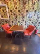 Dining table complete with two chairs, the dining table with a copper inlay top on a cast base, 50 x